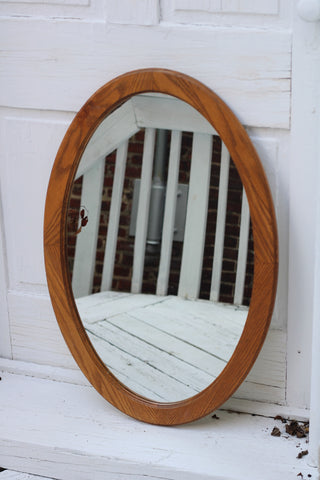 Oval frame mirror