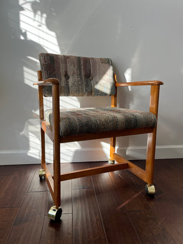 Rolling Tufted Armchair